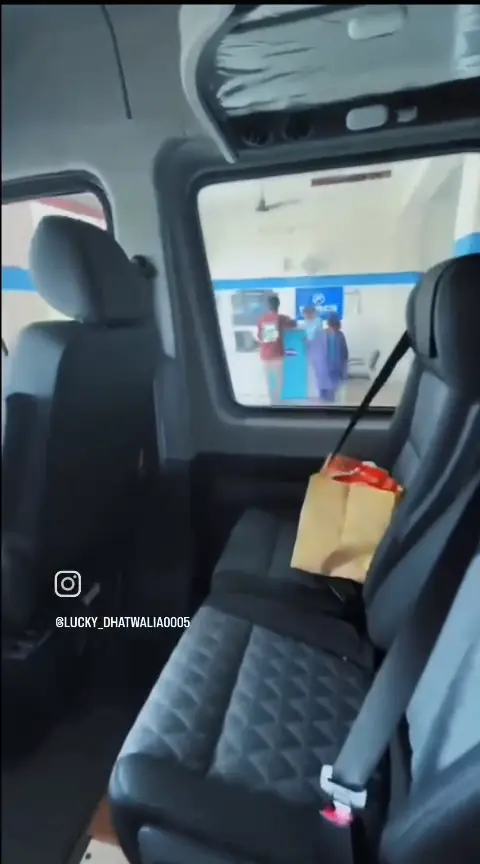 Quilted leather pushback seat with armrest inside the Urbania